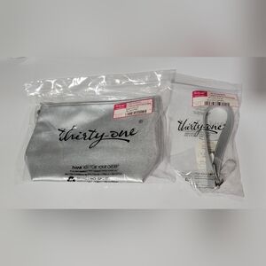 New in packages- Thirty-One's Tapered Pouch & Wristlet Strap- Silver Metallic